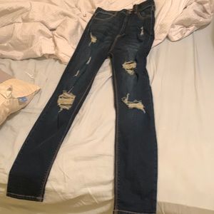 New denim jeans distressed with tags